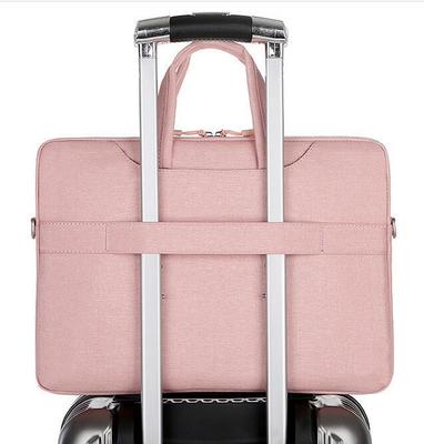 手提电脑包轻松固定在行李箱拉杆上的实用指南